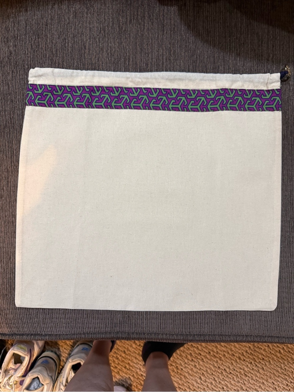 Tory Burch drawstring dust bag in a cream color 15 1/2” x 13 3/4”